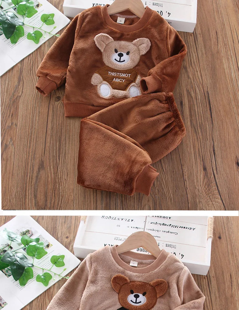 Naptime Cub baby fleece sleepwear set featuring a cartoon bear design for boys and girls aged 1-2 years.