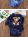 Naptime Cub baby fleece sleepwear set for ages 1-2, featuring a cute bear design and cozy plush material.