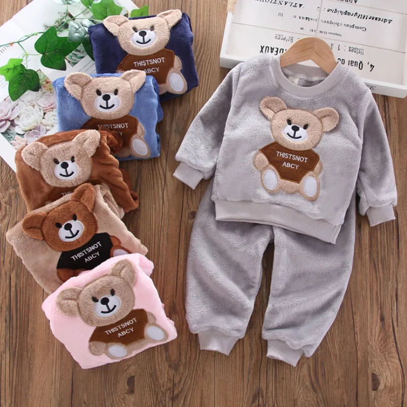 Naptime Cub baby fleece sleepwear set in various colors featuring a cute cartoon bear design for ages 1-2 years.