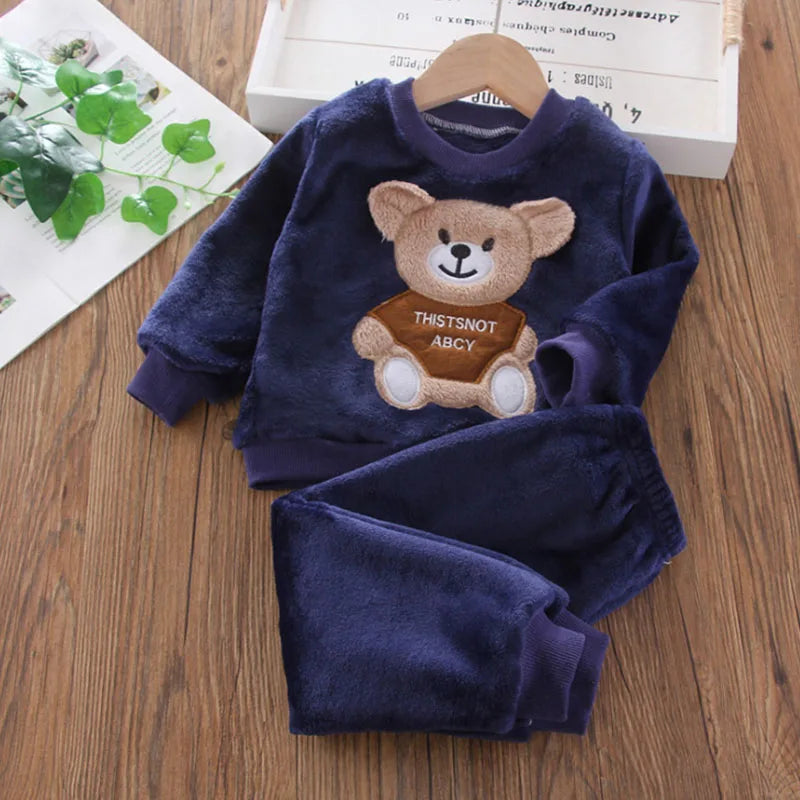 Naptime Cub baby fleece sleepwear set for boys and girls, featuring a cartoon bear design, ideal for ages 1-2 years.